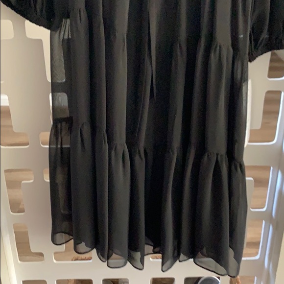 A black classy mid length dress - Picture 3 of 3